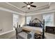 Main bedroom with ensuite bathroom and sitting area at 3179 Clairebrooke Ave, Atlanta, GA 30341
