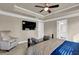 Main bedroom with TV and ensuite bathroom access at 3179 Clairebrooke Ave, Atlanta, GA 30341