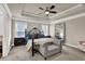 Spacious main bedroom with a ceiling fan and large windows at 3179 Clairebrooke Ave, Atlanta, GA 30341