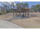 Community pergola with seating for outdoor relaxation at 3179 Clairebrooke Ave, Atlanta, GA 30341