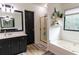 Updated bathroom with walk-in shower and double vanity at 4222 Honey Creek Way, Powder Springs, GA 30127