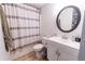 Basement bathroom with a shower/tub combo and vanity at 4222 Honey Creek Way, Powder Springs, GA 30127