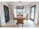 Bright dining area with a round table and access to a deck at 4222 Honey Creek Way, Powder Springs, GA 30127