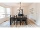 Bright dining room featuring a chandelier and hardwood floors at 4222 Honey Creek Way, Powder Springs, GA 30127
