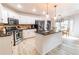 Modern kitchen featuring stainless steel appliances and an island at 4222 Honey Creek Way, Powder Springs, GA 30127