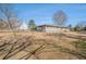 House backyard with fenced yard and view of church at 6747 Rockland Rd, Lithonia, GA 30038