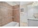 Updated bathroom with tile shower and granite countertop at 6747 Rockland Rd, Lithonia, GA 30038
