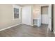 Spacious bedroom with wood-look floors and ample closet space at 6747 Rockland Rd, Lithonia, GA 30038