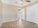 Bedroom with double closet and wood-look flooring at 6747 Rockland Rd, Lithonia, GA 30038