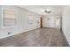 Living room with hardwood floors and lots of natural light at 6747 Rockland Rd, Lithonia, GA 30038