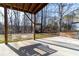 View of backyard featuring a patio, swing, and playhouse at 4801 Daniel Mill Rd, Winston, GA 30187