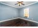 Clean and bright bedroom featuring dark floors at 4801 Daniel Mill Rd, Winston, GA 30187