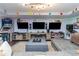 Fun game room with multiple screens, consoles, and seating at 4801 Daniel Mill Rd, Winston, GA 30187