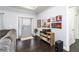 Cozy living room featuring a comfortable sofa, hardwood floors, and stylish decor at 4801 Daniel Mill Rd, Winston, GA 30187