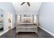 Light filled bedroom boasts a decorative bed frame and light gray walls at 4801 Daniel Mill Rd, Winston, GA 30187