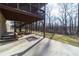 Spacious covered patio with a swing, perfect for outdoor enjoyment at 4801 Daniel Mill Rd, Winston, GA 30187