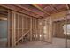 Unfinished basement is framed and has pink insulation, ready for new owners to finish to their liking at 250 Shawnee Trl, Dallas, GA 30157