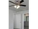 Bedroom featuring a ceiling fan and ensuite bathroom at 250 Shawnee Trl, Dallas, GA 30157