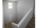 Bright entryway featuring hardwood floors and a staircase leading to the upper level at 250 Shawnee Trl, Dallas, GA 30157