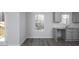 A bright, eat-in kitchen area with granite countertops and lots of natural light at 250 Shawnee Trl, Dallas, GA 30157