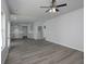 Spacious living room showcases modern flooring, an open layout, and an adjacent kitchen area at 250 Shawnee Trl, Dallas, GA 30157