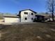 A spacious back yard with a small deck at 2715 Heritage Ln, Morrow, GA 30260