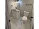 Updated bathroom featuring a new vanity, toilet, and modern fixtures at 2715 Heritage Ln, Morrow, GA 30260