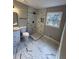 Bathroom features modern fixtures, stylish design and a walk-in shower at 2715 Heritage Ln, Morrow, GA 30260