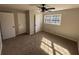 Bedroom features carpet, natural light, a ceiling fan and closet at 2715 Heritage Ln, Morrow, GA 30260