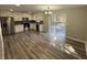 A kitchen with stainless steel appliances and luxury vinyl plank flooring at 2715 Heritage Ln, Morrow, GA 30260