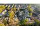 Aerial view showcases a neighborhood with homes surrounded by a canopy of trees at 2678 Greentree Se Dr, Marietta, GA 30067