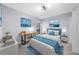 Bedroom with a desk, bed, and artwork at 2678 Greentree Se Dr, Marietta, GA 30067