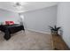 Simple bedroom with a bed and bench at 2678 Greentree Se Dr, Marietta, GA 30067