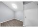Bright bedroom with grey walls and wood-look flooring at 2678 Greentree Se Dr, Marietta, GA 30067