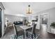 Bright living room features an open layout, dining area, and modern décor at 2678 Greentree Se Dr, Marietta, GA 30067
