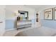 Bedroom with dresser, view into another room, and basketball poster at 7049 Brushwood Bend (Lot 59), Lithonia, GA 30058