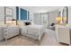Spacious bedroom with king-size bed and stylish decor at 7049 Brushwood Bend (Lot 59), Lithonia, GA 30058