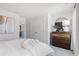 Bright bedroom with double-door closet and dresser at 7049 Brushwood Bend (Lot 59), Lithonia, GA 30058