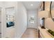 Inviting entryway with light flooring and view to living room at 7049 Brushwood Bend (Lot 59), Lithonia, GA 30058
