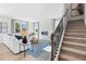 Spacious living room with fireplace and ample natural light at 7049 Brushwood Bend (Lot 59), Lithonia, GA 30058