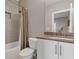 Neutral bathroom with tub/shower combo, recessed niche, and white vanity with bronze fixtures at 215 Arizona Ne Ave # 2, Atlanta, GA 30307