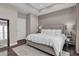 Cozy bedroom with a large window and elegant bedside tables at 215 Arizona Ne Ave # 2, Atlanta, GA 30307