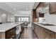 Spacious kitchen with center island and seating, stainless appliances, and white subway tile at 215 Arizona Ne Ave # 2, Atlanta, GA 30307