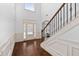 Two story foyer with hardwood floors and an elegant staircase at 313 Pennant Ln, Fairburn, GA 30213