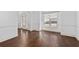 Hardwood floors, large windows, and neutral colors at 313 Pennant Ln, Fairburn, GA 30213