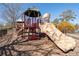A colorful playground for featuring multiple slides and climbing structures at 313 Pennant Ln, Fairburn, GA 30213