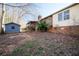 Backyard with brick home, shed, and covered deck at 4453 White Oak Dr, Sugar Hill, GA 30518