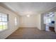 Inviting dining area featuring abundant natural light, seamlessly connected to the kitchen space at 4453 White Oak Dr, Sugar Hill, GA 30518