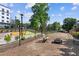 Community dog park with benches and fire pit at 5200 Peachtree Rd # 3116, Chamblee, GA 30341