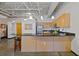Modern kitchen with island and stainless steel appliances at 5200 Peachtree Rd # 3116, Chamblee, GA 30341